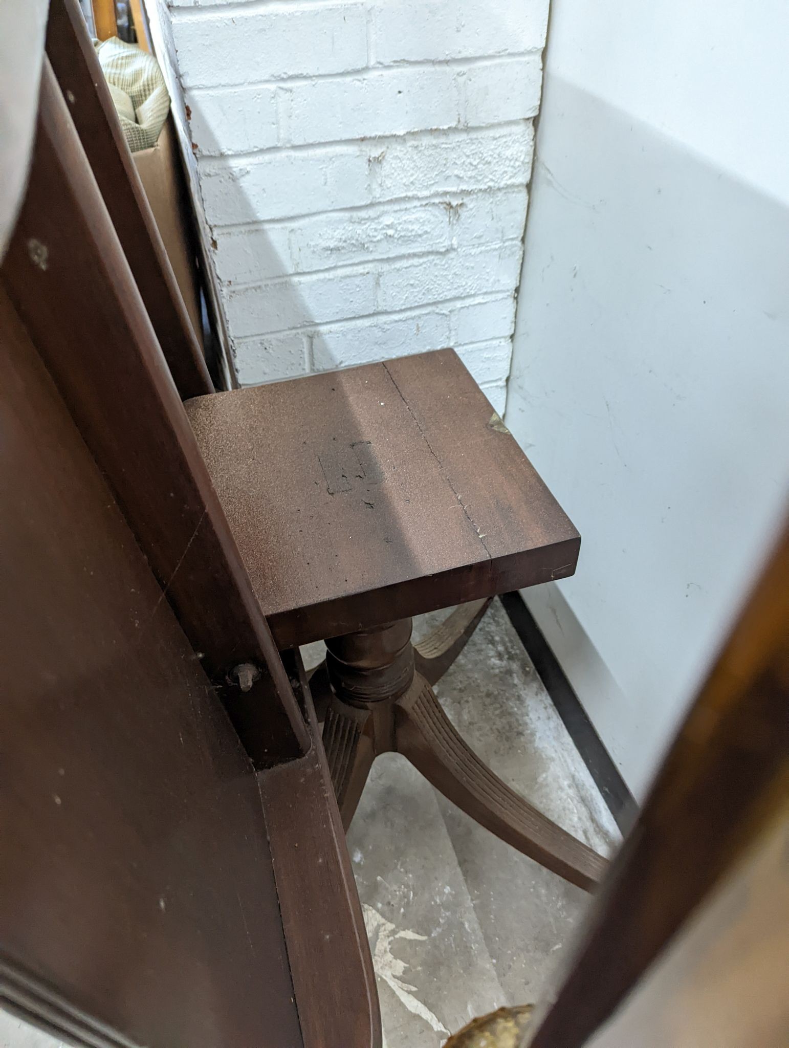 A Regency mahogany rectangular tilt top dining table, width 101cm, depth 118cm, height 72cm